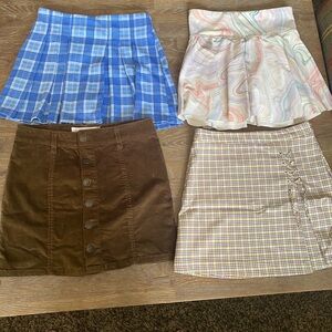Girls clothes! Lot of 4 skirts and 2 shirts